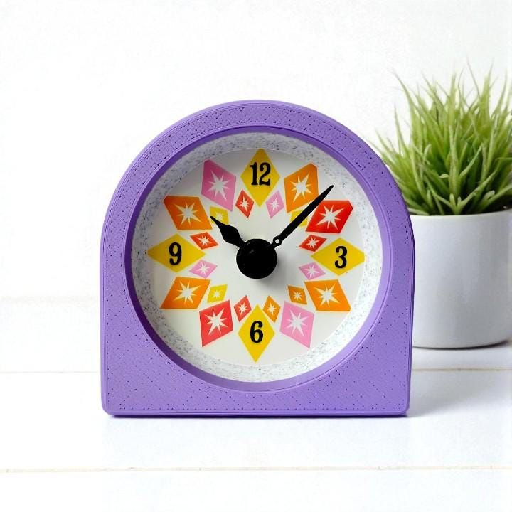 Purple Starburst Clock